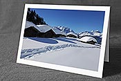 Fotokarte F065465: Tief verschneite Alphütten
